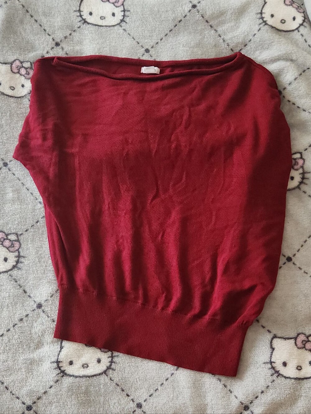 Garage asymmetrical sweater